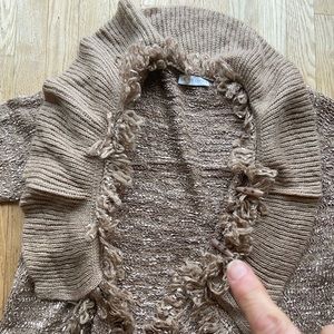 Elegant sweater. Wear it buttoned or open!